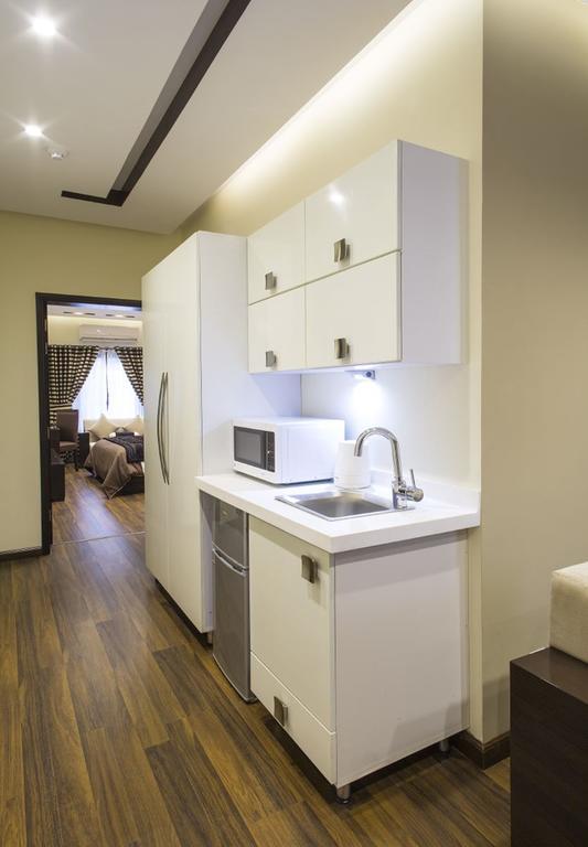 Royaute Luxury Suites And Hotel Gulberg Lahore Ruang foto